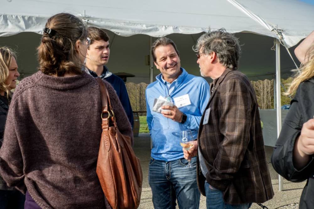 Alums talking at Rove Winery.